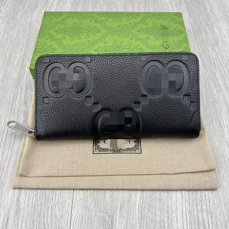 Black Embossed Monogram Zip-Around Long Wallet — merchant catalogue photo