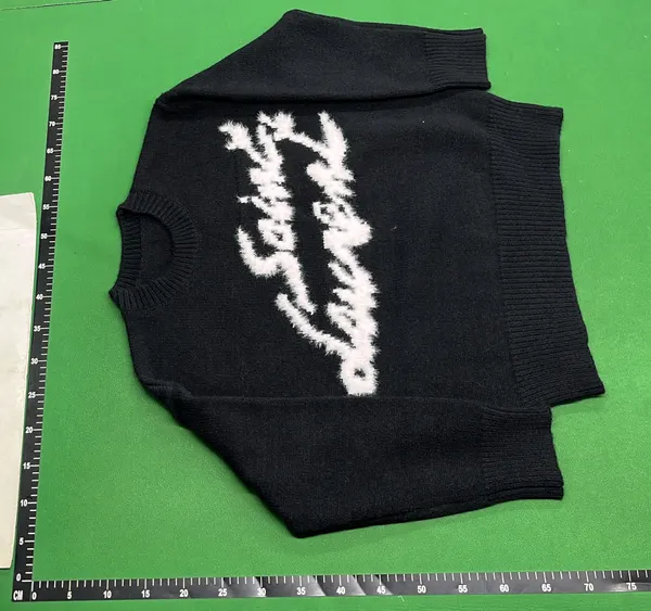 Black Fuzzy Knit Sweater With Script Graphic — warehouse QC photo 6