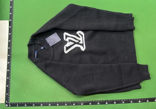 Black Knit Crewneck Sweater With Chest Graphic — warehouse QC photo 2
