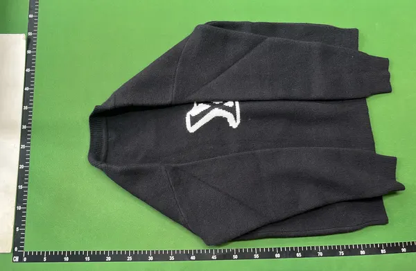 Black Knit Crewneck Sweater With Chest Graphic — warehouse QC photo 3