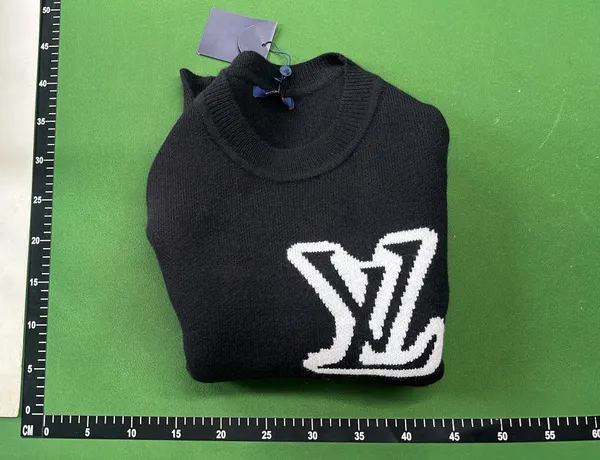 Black Knit Crewneck Sweater With Chest Graphic — warehouse QC photo 4