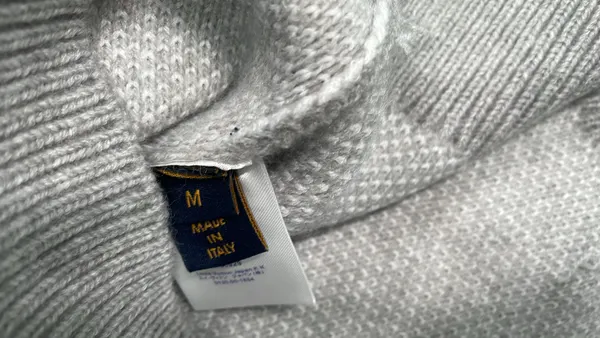 Black Knit Crewneck Sweater With Chest Graphic — warehouse QC photo 5
