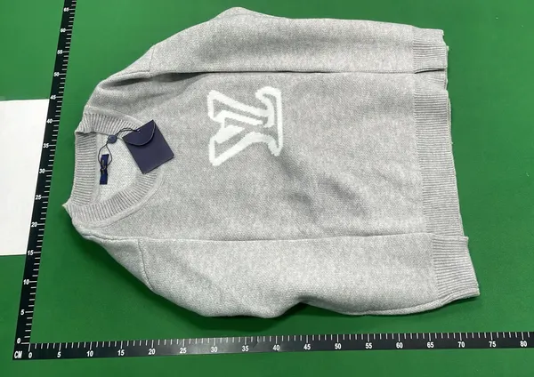Black Knit Crewneck Sweater With Chest Graphic — warehouse QC photo 6