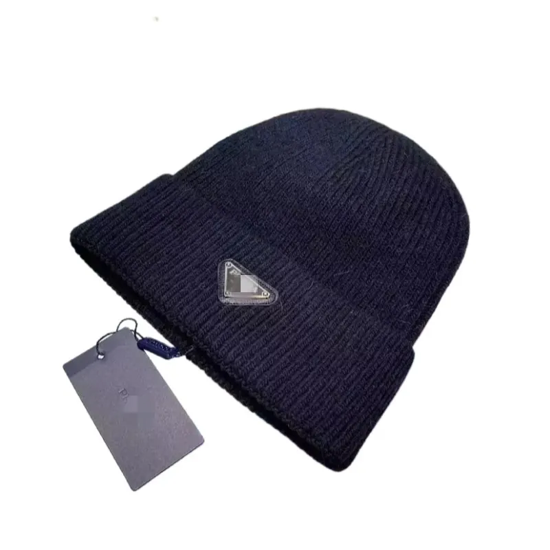 Ribbed Knit Cuffed Beanie With Triangle Badge — merchant catalogue photo
