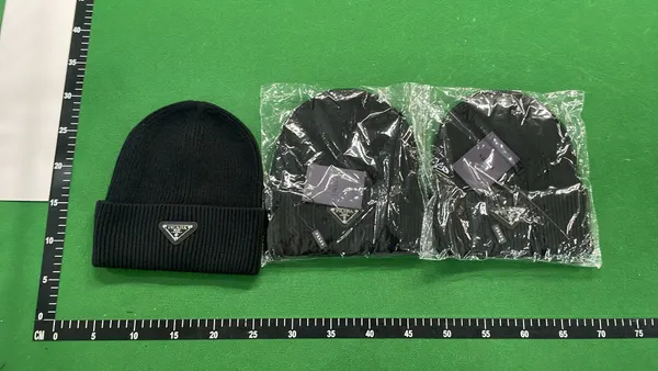 Ribbed Knit Cuffed Beanie With Triangle Badge — warehouse QC photo 6