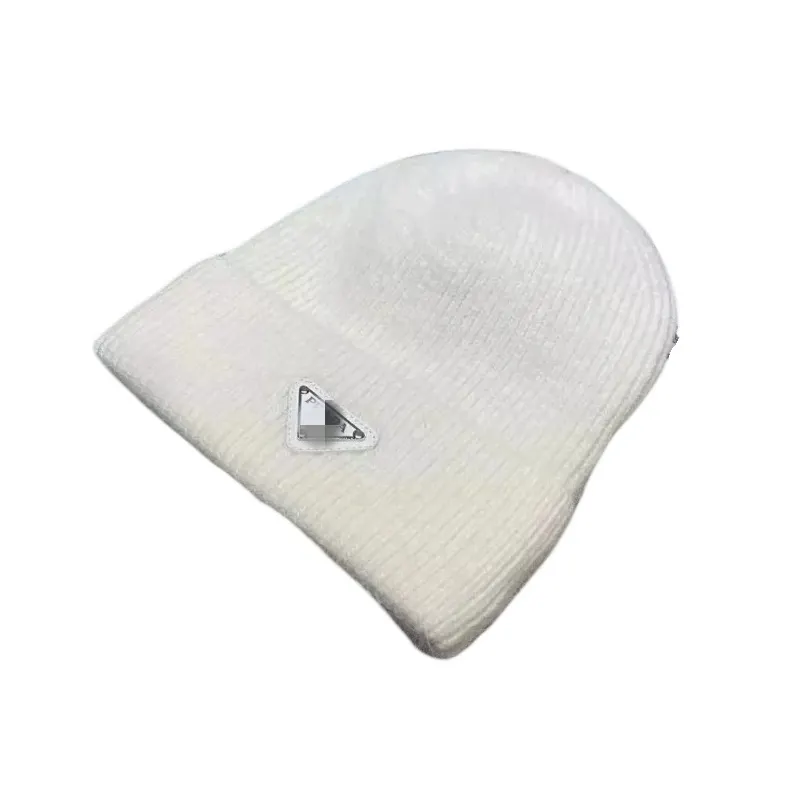 Ribbed Knit Cuffed Beanie With Triangle Badge (White) — merchant catalogue photo