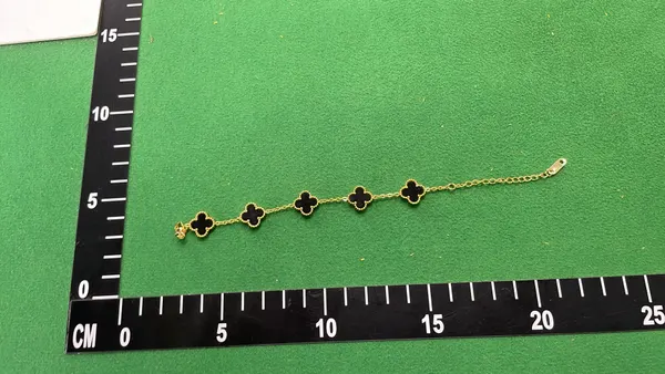 Gold Tone Chain Bracelet With Clover Charms — warehouse QC photo 1