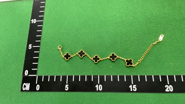 Gold Tone Chain Bracelet With Clover Charms — warehouse QC photo 2