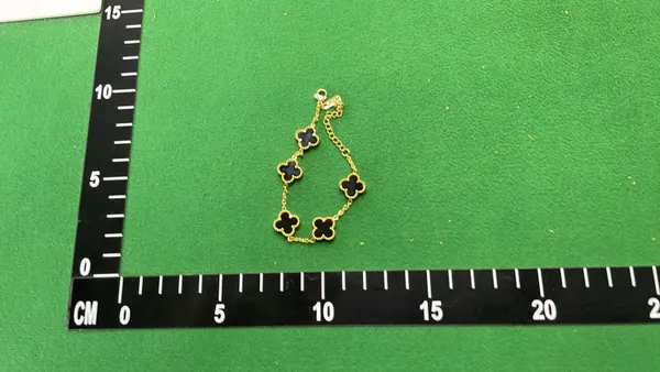 Gold Tone Chain Bracelet With Clover Charms — warehouse QC photo 3