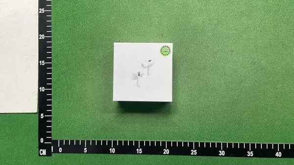 White Wireless Earbuds And Over-Ear Headphones — warehouse QC photo 1