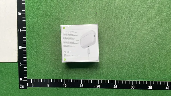 White Wireless Earbuds And Over-Ear Headphones — warehouse QC photo 2