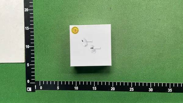White Wireless Earbuds And Over-Ear Headphones — warehouse QC photo 3