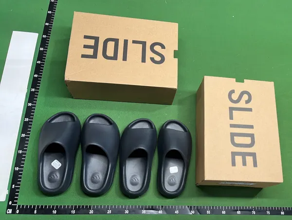 Molded Foam Slide Sandals With Ridged Sole — warehouse QC photo 1