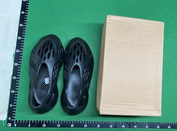 Molded Foam Clogs With Cutout Vents (White) — warehouse QC photo 1