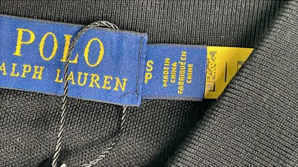Black Pique Cotton Short-Sleeve Polo Shirt — warehouse QC photo 5