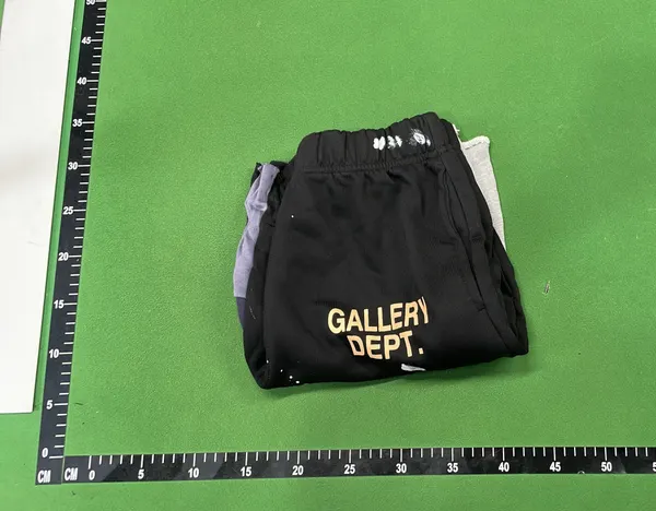 Black Paint Splatter Sweatpants With Split Hems — warehouse QC photo 4