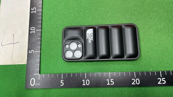 Black Quilted Puffer Phone Case — warehouse QC photo 1