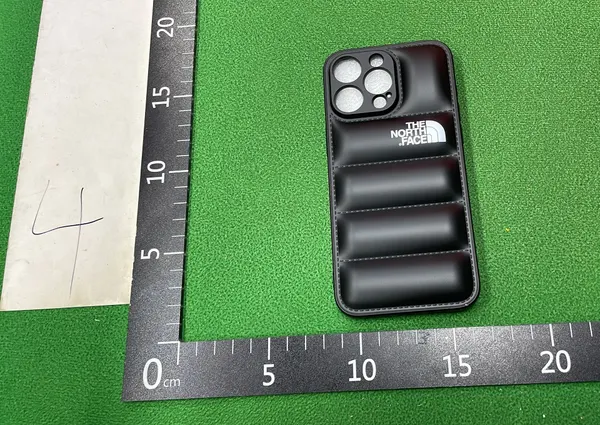 Black Quilted Puffer Phone Case — warehouse QC photo 3