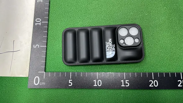 Black Quilted Puffer Phone Case — warehouse QC photo 4