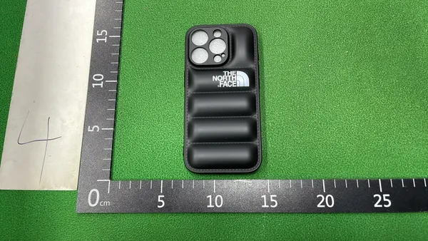 Black Quilted Puffer Phone Case — warehouse QC photo 6