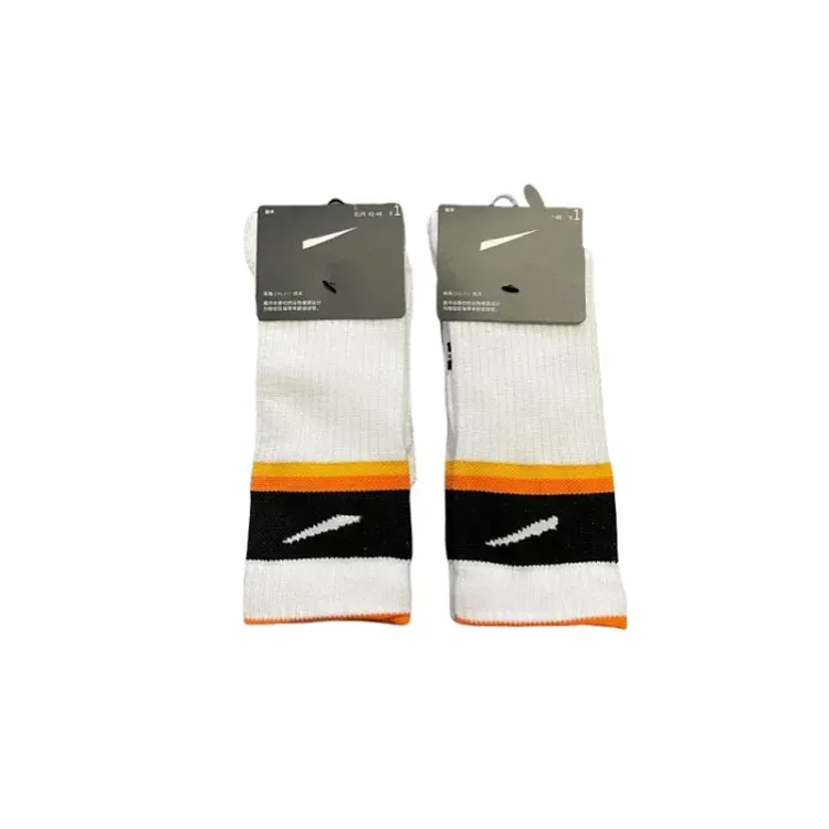 White Crew Socks With Orange And Black Stripes — merchant catalogue photo