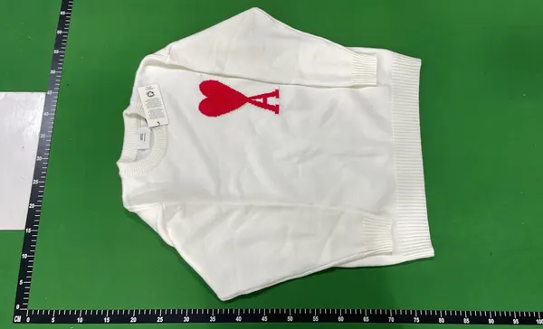 Black Knit Sweater With Red Heart Motif — warehouse QC photo 2