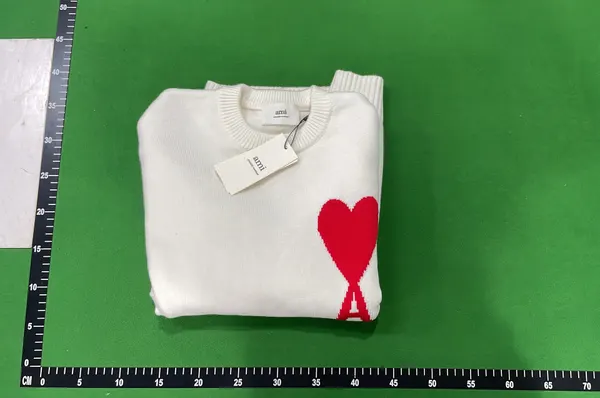 Black Knit Sweater With Red Heart Motif — warehouse QC photo 4