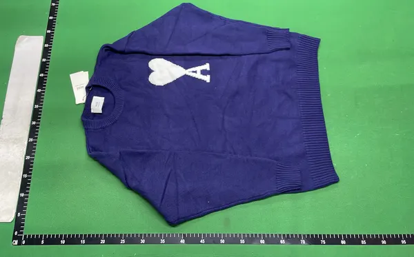 Black Knit Sweater With Red Heart Motif — warehouse QC photo 6