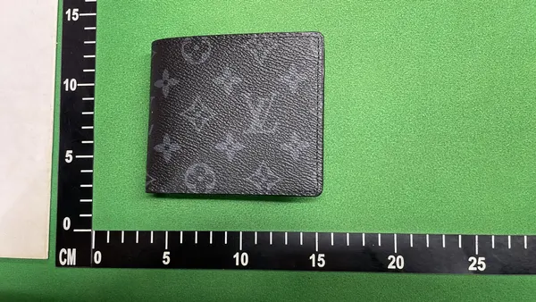 Black Monogram Print Bifold Wallet — warehouse QC photo 1