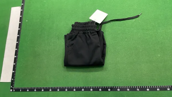 Black Sweat Shorts With Vertical Leg Print — warehouse QC photo 4