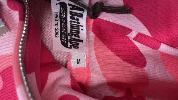 Grey Camo Full-Zip Hoodie With Face Graphic — warehouse QC photo 1