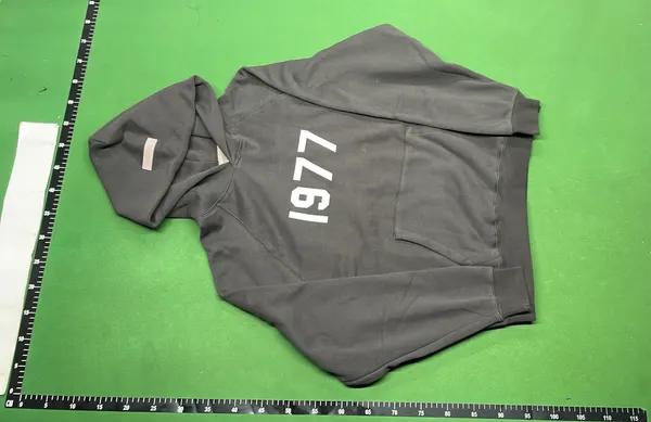 Washed Black Pullover Hoodie With Flocked Numerals — warehouse QC photo 2