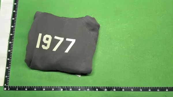 Washed Black Pullover Hoodie With Flocked Numerals — warehouse QC photo 4