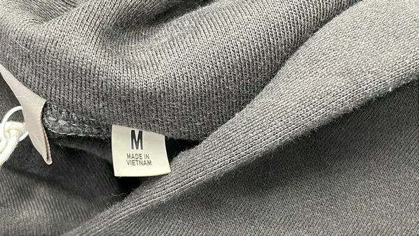 Washed Black Pullover Hoodie With Flocked Numerals — warehouse QC photo 5