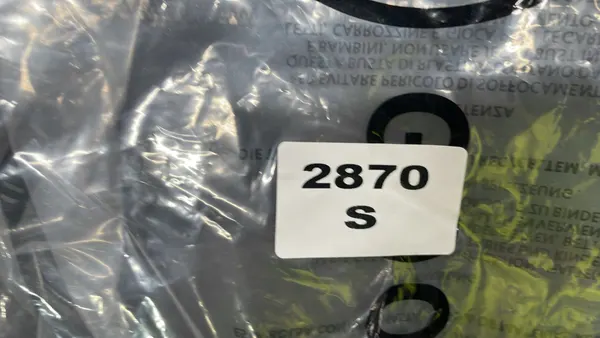 Quilted Down Puffer Vest With Stand Collar — warehouse QC photo 1