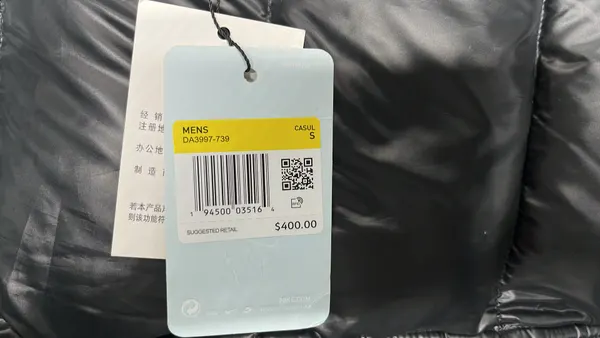 Glossy Black Puffer Jacket With Stand Collar — warehouse QC photo 1