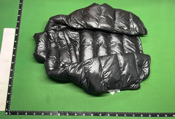 Glossy Black Puffer Jacket With Stand Collar — warehouse QC photo 3