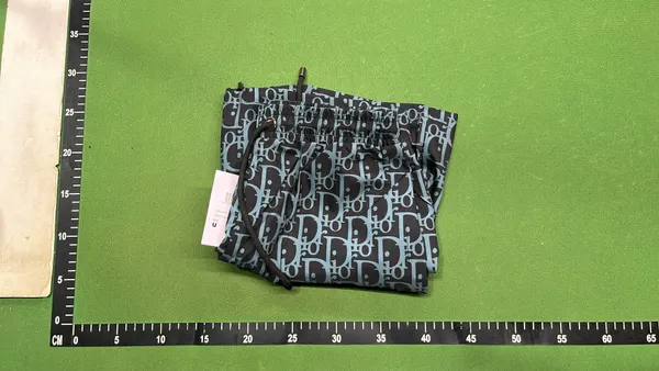 All-Over Monogram Print Drawstring Shorts — warehouse QC photo 4