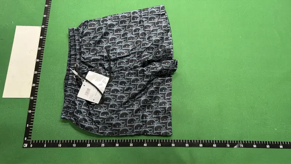 All-Over Monogram Print Drawstring Shorts — warehouse QC photo 6