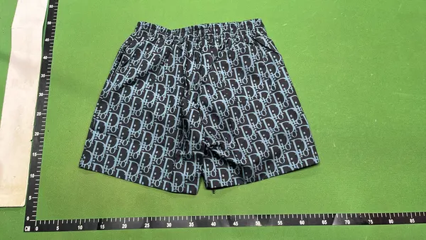 All-Over Monogram Print Drawstring Shorts (White) — warehouse QC photo 3