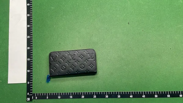 Black Embossed Monogram Long Bifold Wallet — warehouse QC photo 1