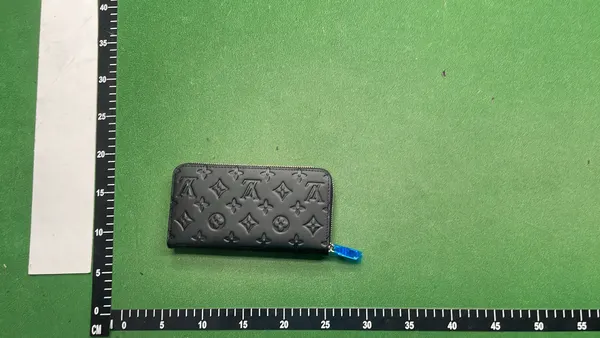 Black Embossed Monogram Long Bifold Wallet — warehouse QC photo 2