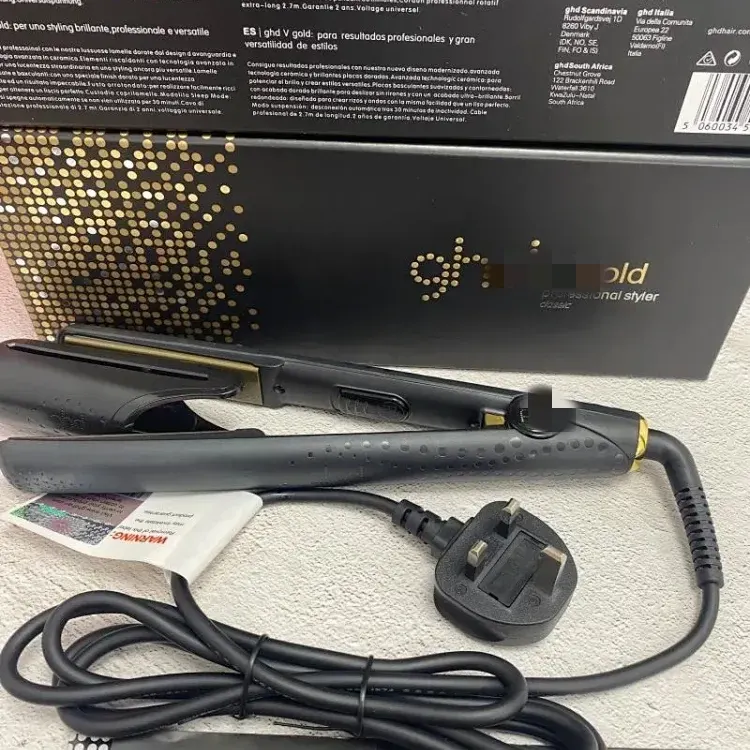 Black Ceramic Hair Straightener With Gold Plates — merchant catalogue photo