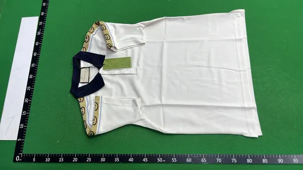 Cream Polo Shirt With Navy Contrast Collar — warehouse QC photo 2