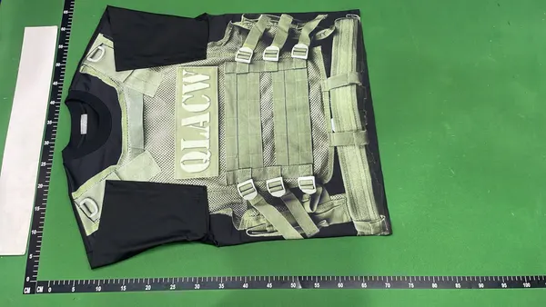 White Oversized T-Shirt With Tactical Vest Print — warehouse QC photo 2