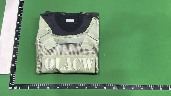 White Oversized T-Shirt With Tactical Vest Print — warehouse QC photo 4