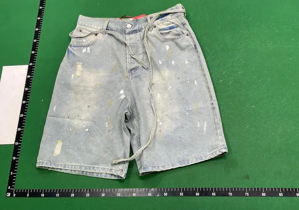 Blue Washed Denim Shorts With Paint Splatter — warehouse QC photo 2