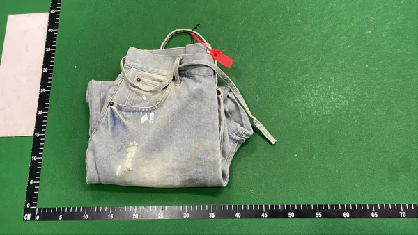 Blue Washed Denim Shorts With Paint Splatter — warehouse QC photo 4