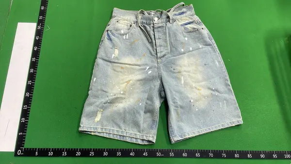 Blue Washed Denim Shorts With Paint Splatter — warehouse QC photo 6