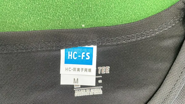 Black Training Tee With Reflective Chest Logo — warehouse QC photo 1